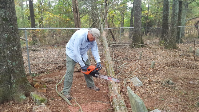 Eric Roberts chainsawing at Roberts Family Cemetery, November 2016